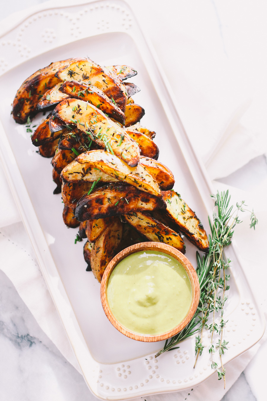 grilled fries with fresh herbs & lemon pesto aioli via playswellwithbutter.com