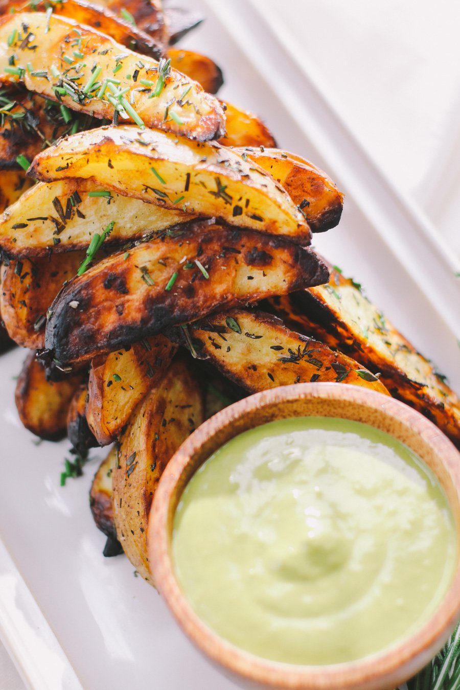 grilled fries with fresh herbs & lemon pesto aioli via playswellwithbutter.com