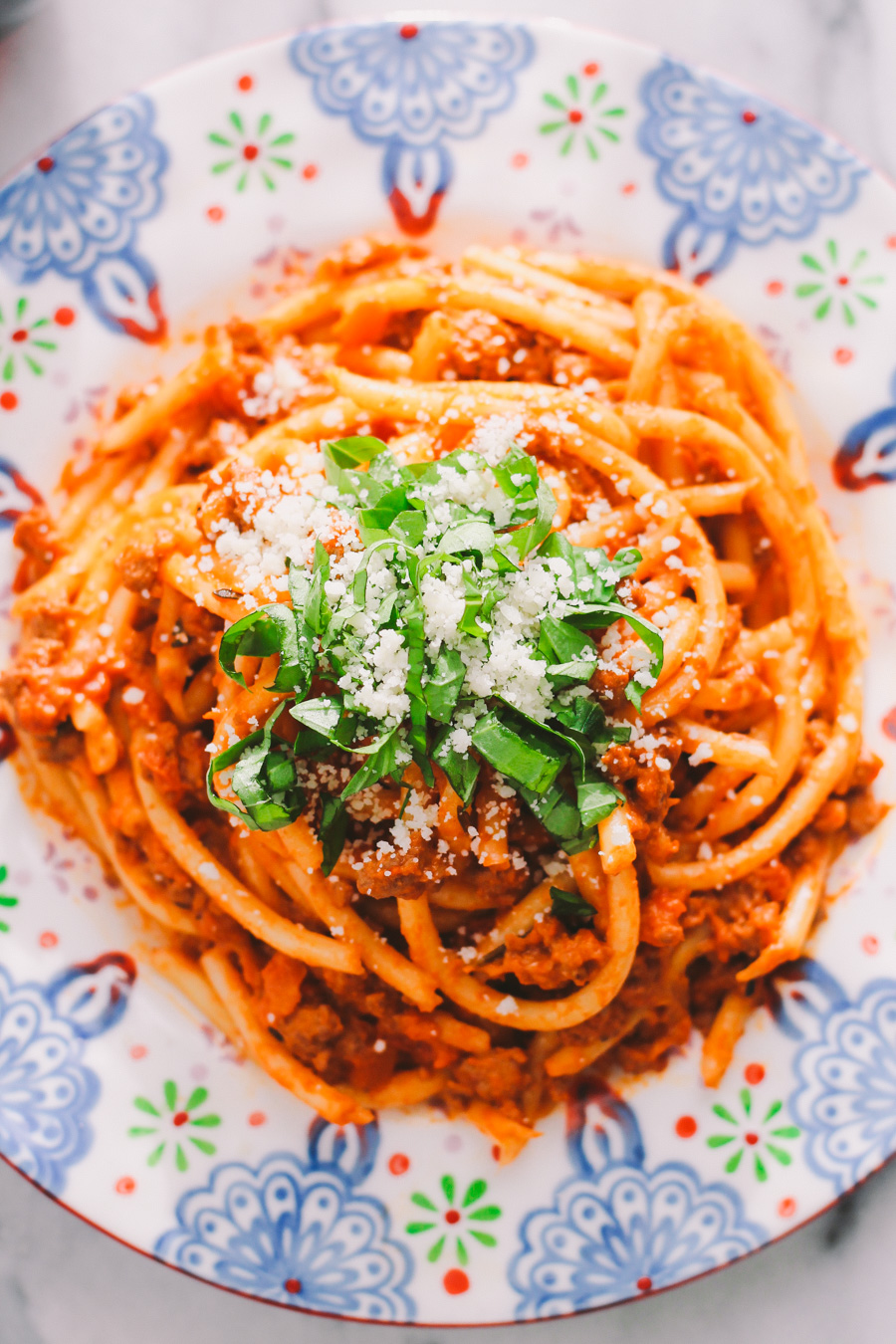 pasta bolognese with bucatini via playswellwithbutter | classic italian comfort food lightened up as a "fauxlognese" by using ground turkey & tons of veggies without compromising any of the flavor! bring an authentic taste of italy into your home with zero guilt!