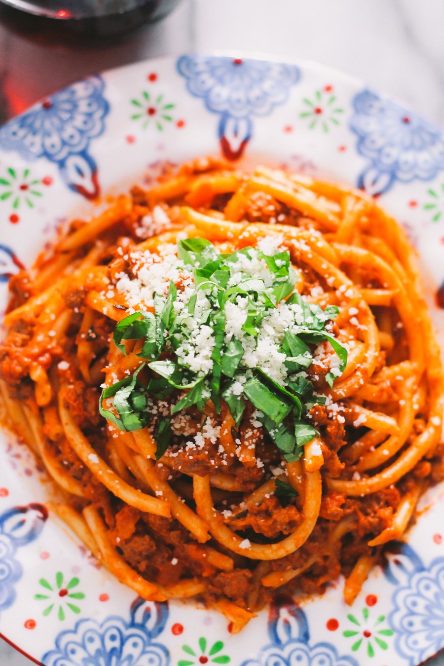 pasta bolognese with bucatini via playswellwithbutter | classic italian comfort food lightened up as a "fauxlognese" by using ground turkey & tons of veggies without compromising any of the flavor! bring an authentic taste of italy into your home with zero guilt!