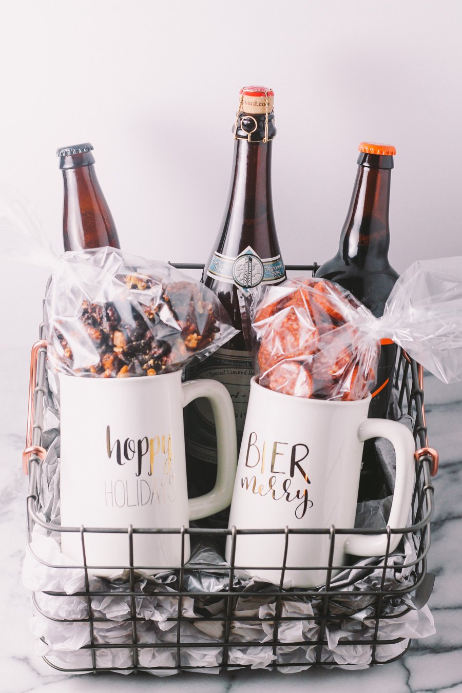 homemade holiday gift basket for the beer lover in your life | a plays well with butter holiday gift basket series | treat the beer lover in your life with a homemade beer gift basket this holiday season with the plays well with butter holiday gift basket series! pair a few great bottles of craft beer with a couple of festive beer glasses & a few handmade bar snacks & you'll totally knock the socks off of any beer nerd!