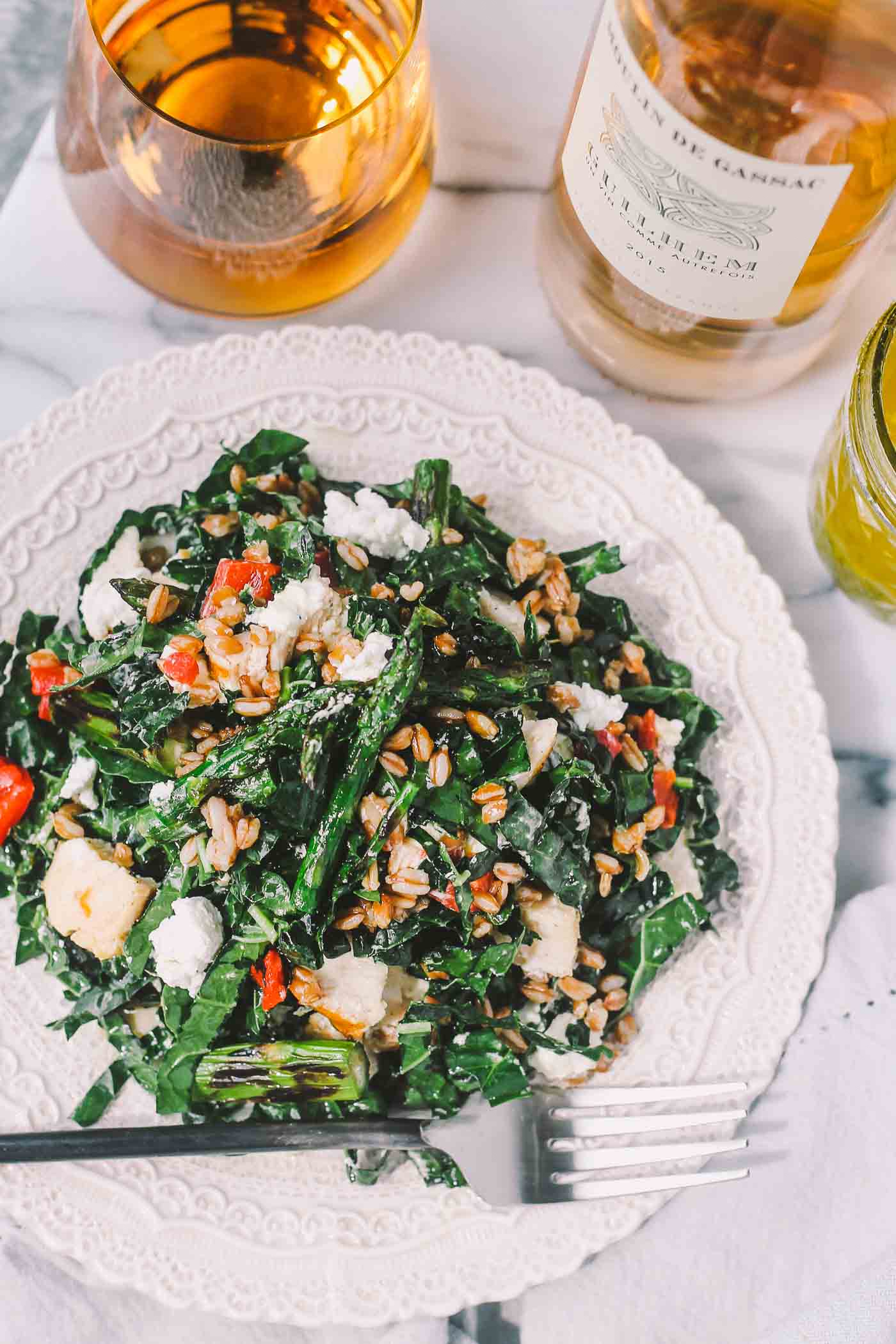 kale salad with grilled lemon herb chicken, farro, & asparagus + 50 recipes for perfect for summer parties! | summer food, summer parties, summer recipes, summer appetizers, summer desserts, summer drinks, easy entertaining, entertaining tips |