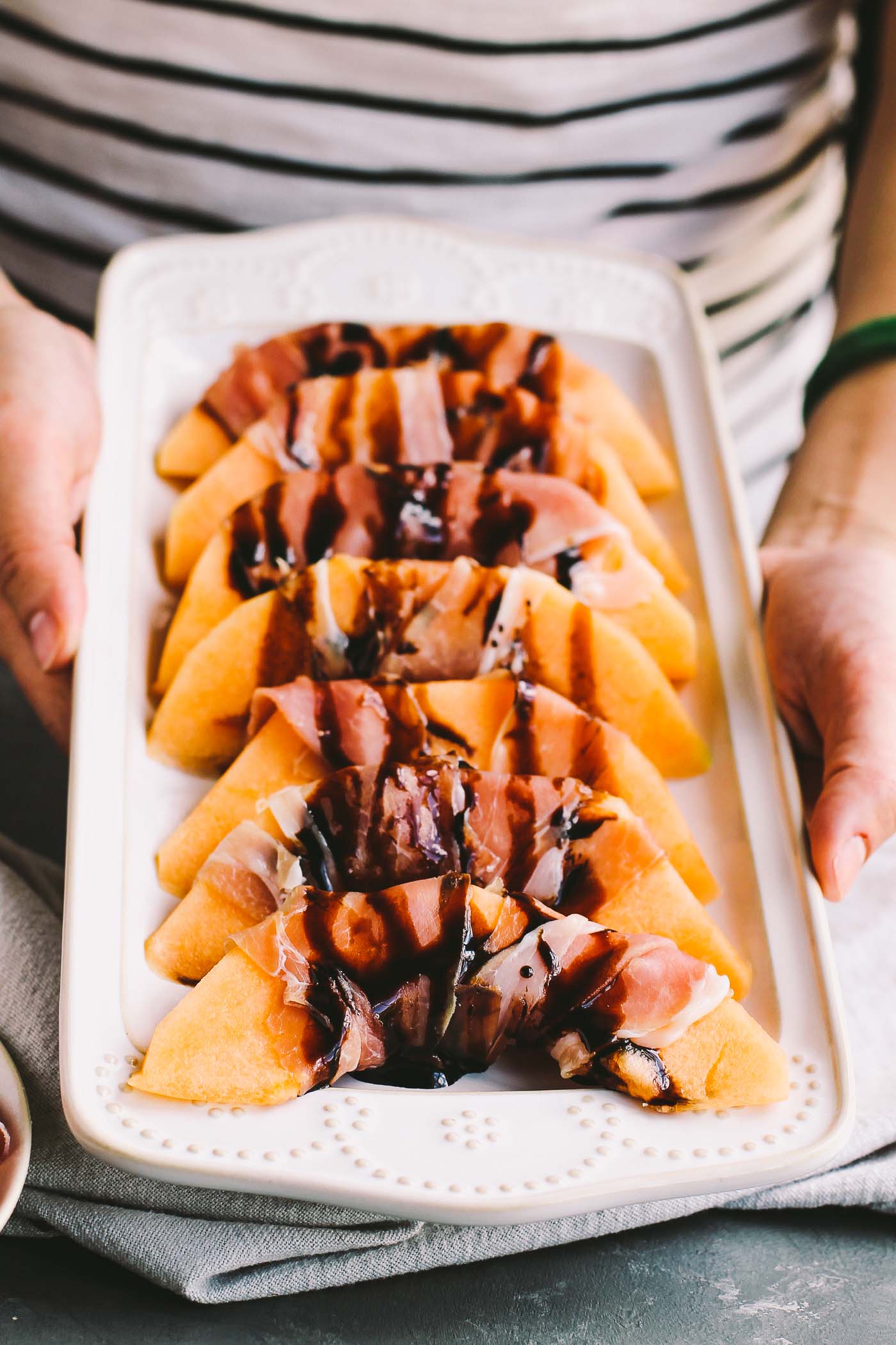 prosciutto-wrapped cantaloupe with balsamic + 50 recipes for perfect for summer parties! | summer food, summer parties, summer recipes, summer appetizers, summer desserts, summer drinks, easy entertaining, entertaining tips |