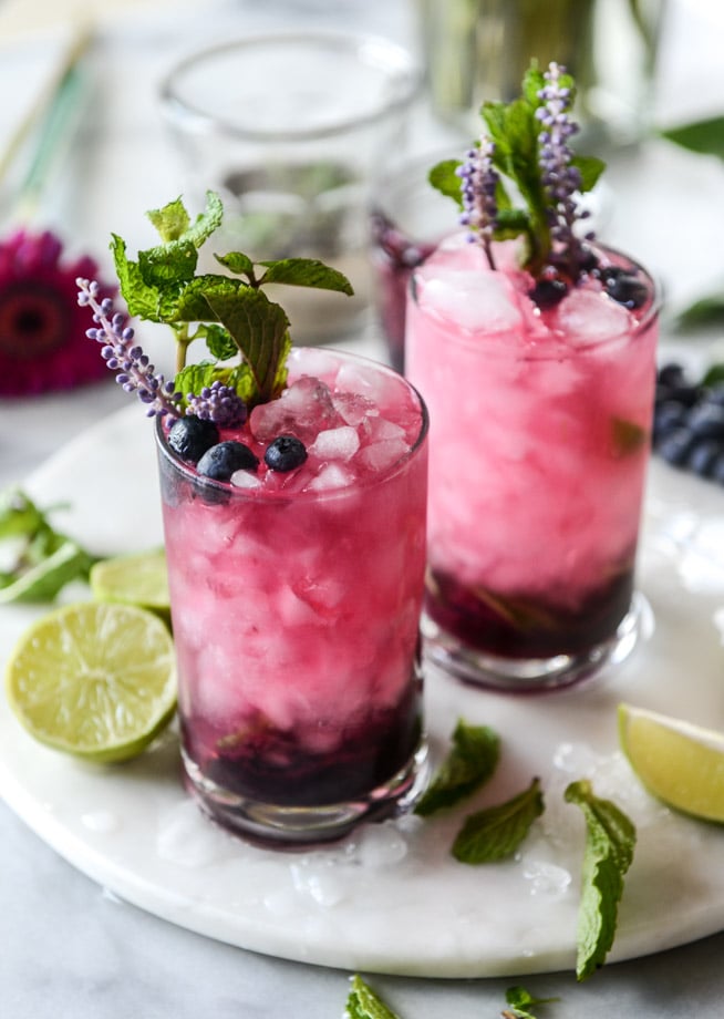 blueberry lavender mojitos + 50 recipes for perfect for summer parties! | summer food, summer parties, summer recipes, summer appetizers, summer desserts, summer drinks, easy entertaining, entertaining tips |
