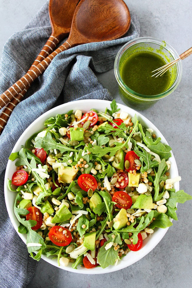 summer arugula salad with basil vinaigrette + 50 recipes for perfect for summer parties! | summer food, summer parties, summer recipes, summer appetizers, summer desserts, summer drinks, easy entertaining, entertaining tips |