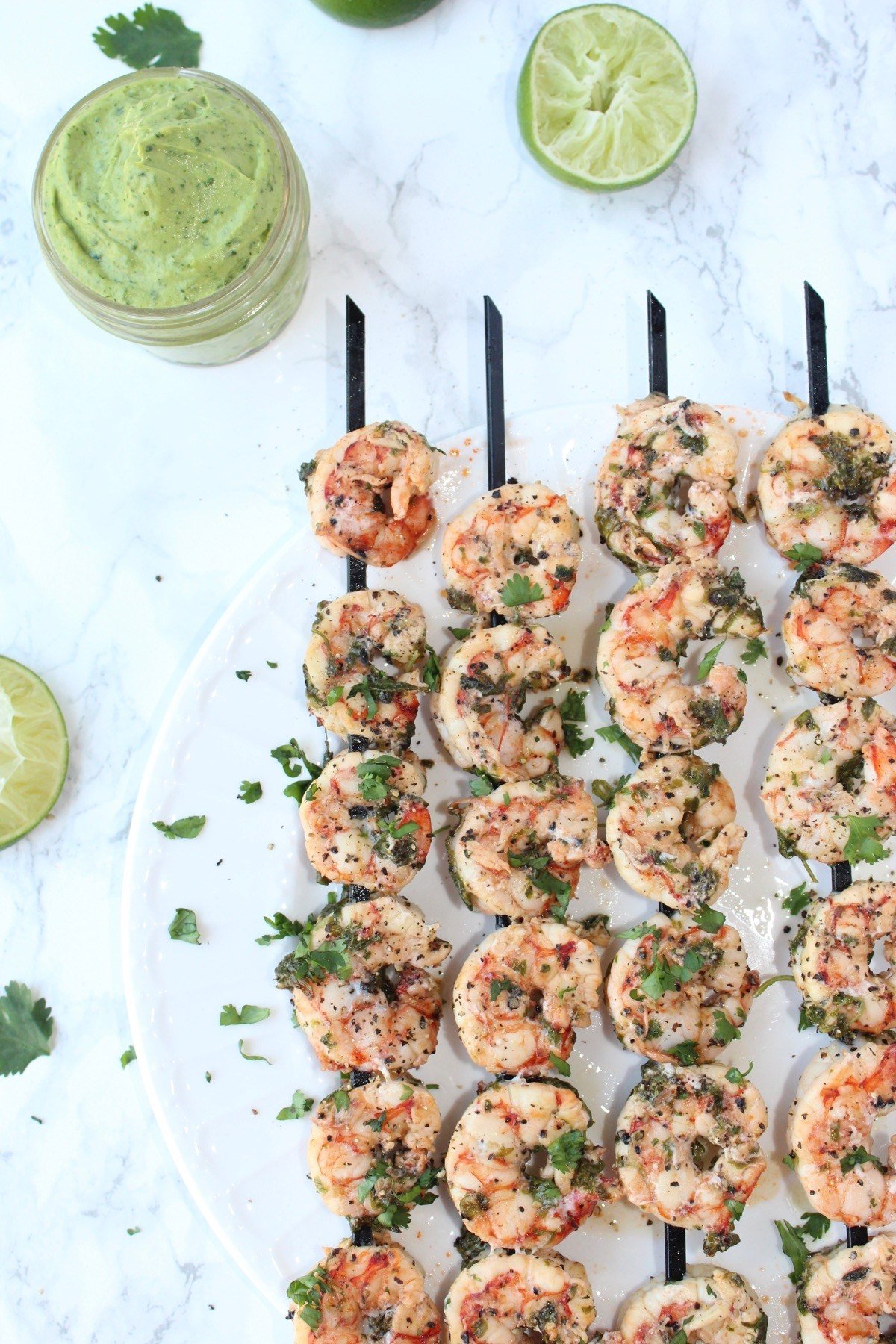 grilled cilantro pepper shrimp with avocado lime dipping sauce + 50 recipes for perfect for summer parties! | summer food, summer parties, summer recipes, summer appetizers, summer desserts, summer drinks, easy entertaining, entertaining tips |