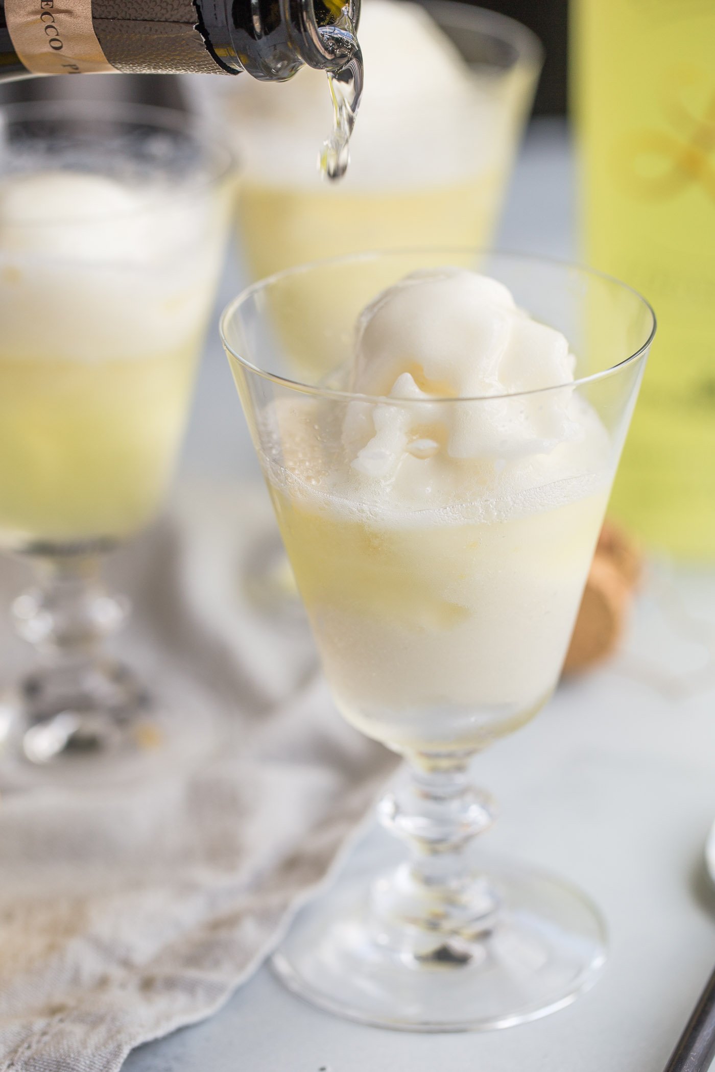 3-ingredient limoncello prosecco floats with lemon sorbetto are the perfect boozy dessert cocktail for summer! a scoop of lemon sorbetto gets simply drowned with a shot of limoncello & topped off with a generous splash of prosecco. light, refreshing, & easy. the perfect ending for any summer gathering!