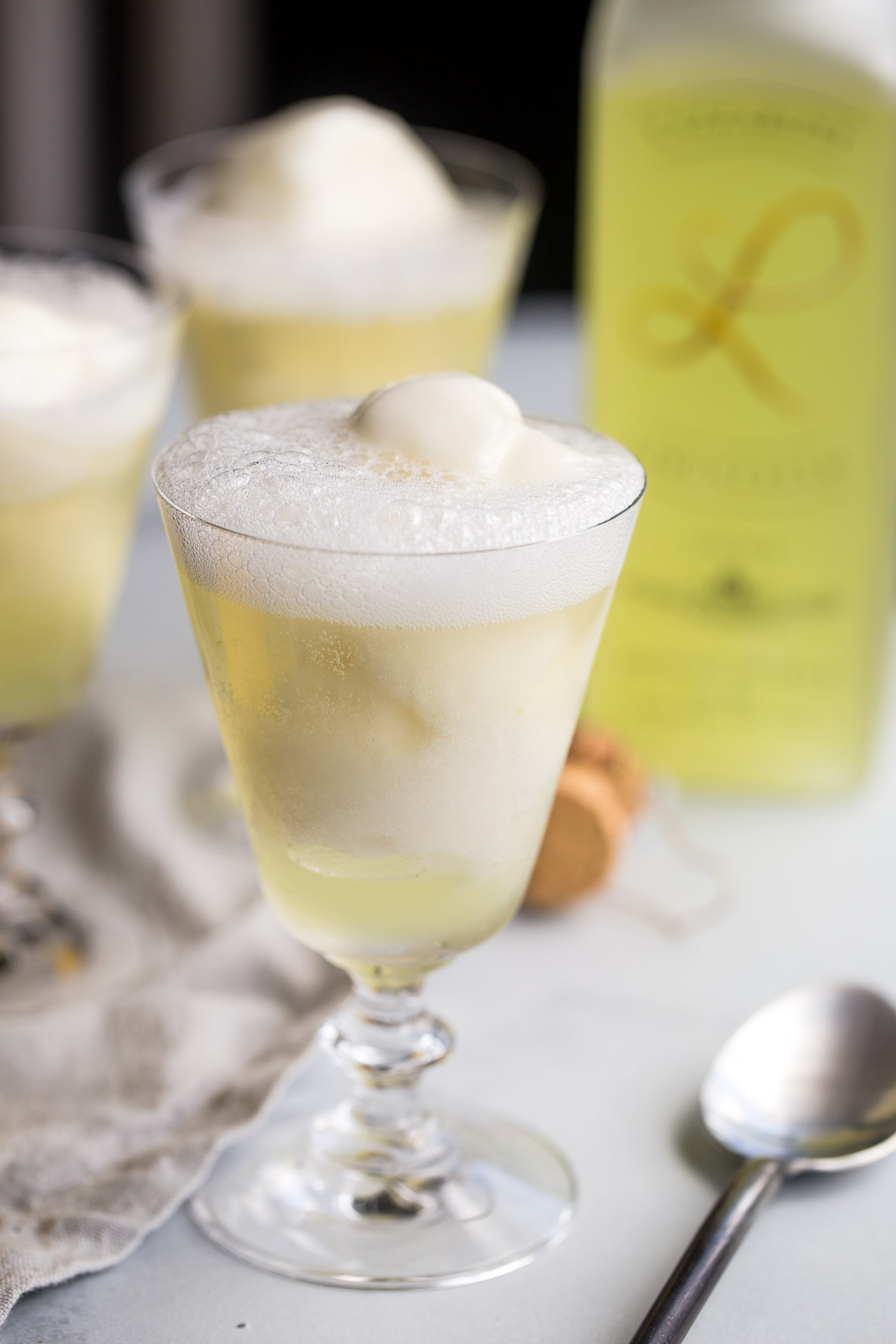 3-ingredient limoncello prosecco floats with lemon sorbetto are the perfect boozy dessert cocktail for summer! a scoop of lemon sorbetto gets simply drowned with a shot of limoncello & topped off with a generous splash of prosecco. light, refreshing, & easy. the perfect ending for any summer gathering!
