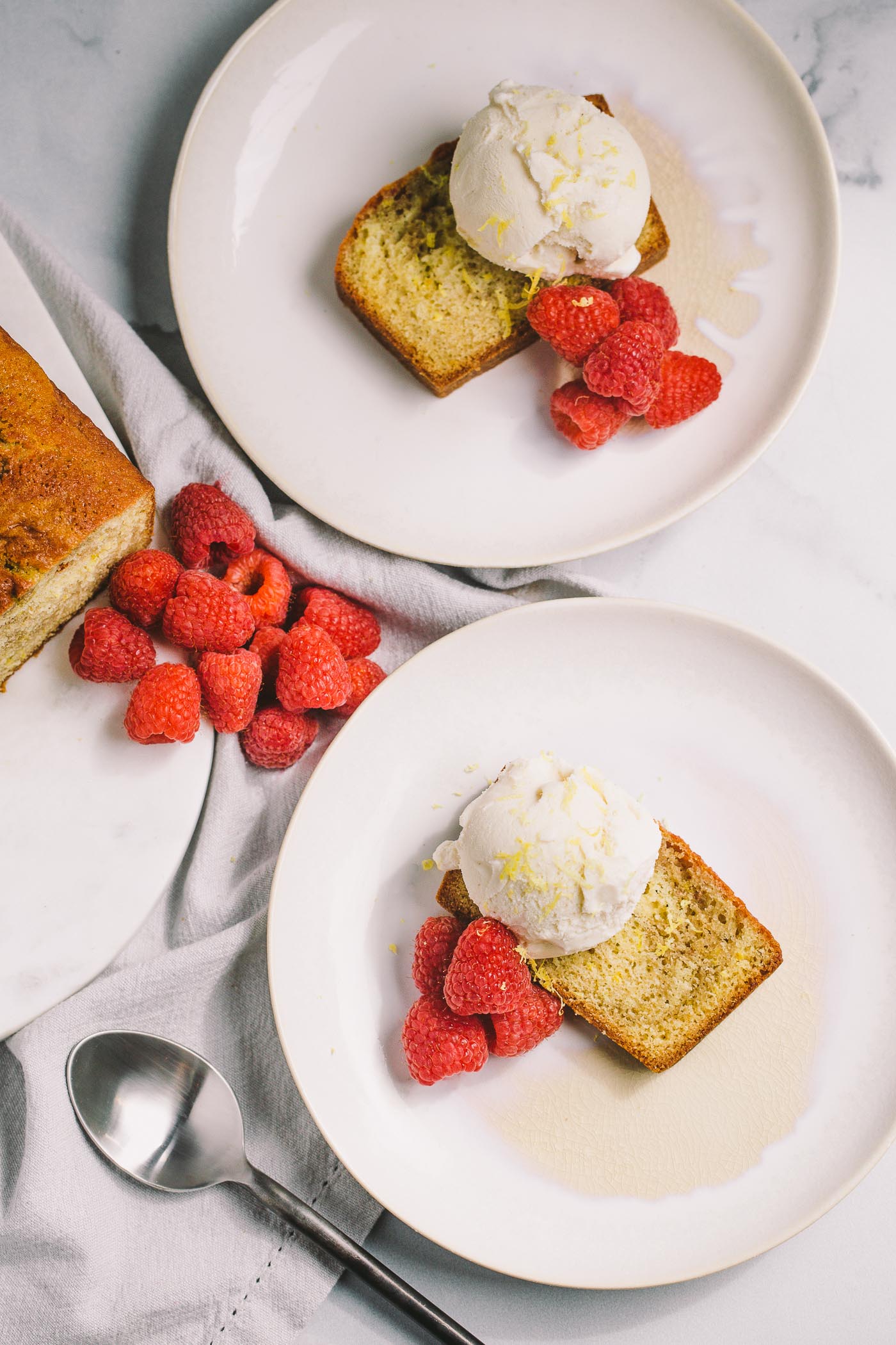 a lemon pound cake swirled with the vibrant flavor of fresh raspberries. topped with a scoop of vanilla bean ice cream, raspberry swirl lemon pound cake is the perfect understated, yet elegant, dessert for summer entertaining.