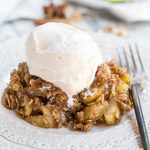 a classic apple crisp updated with the warm flavors of chai, this chai spiced apple crisp is loaded with chai flavor! crisp granny smith apples tossed in a chai spice blend of cinnamon, cardamom, nutmeg, ginger & allspice & baked under a generous layer of homemade crisp. the perfect cozy fall dessert to celebrate all things autumn (especially served warm with a scoop of vanilla ice cream…). #playswellwithbutter #chaispice #applecrisp #chaiapplecrisp #fallbaking #applerecipes