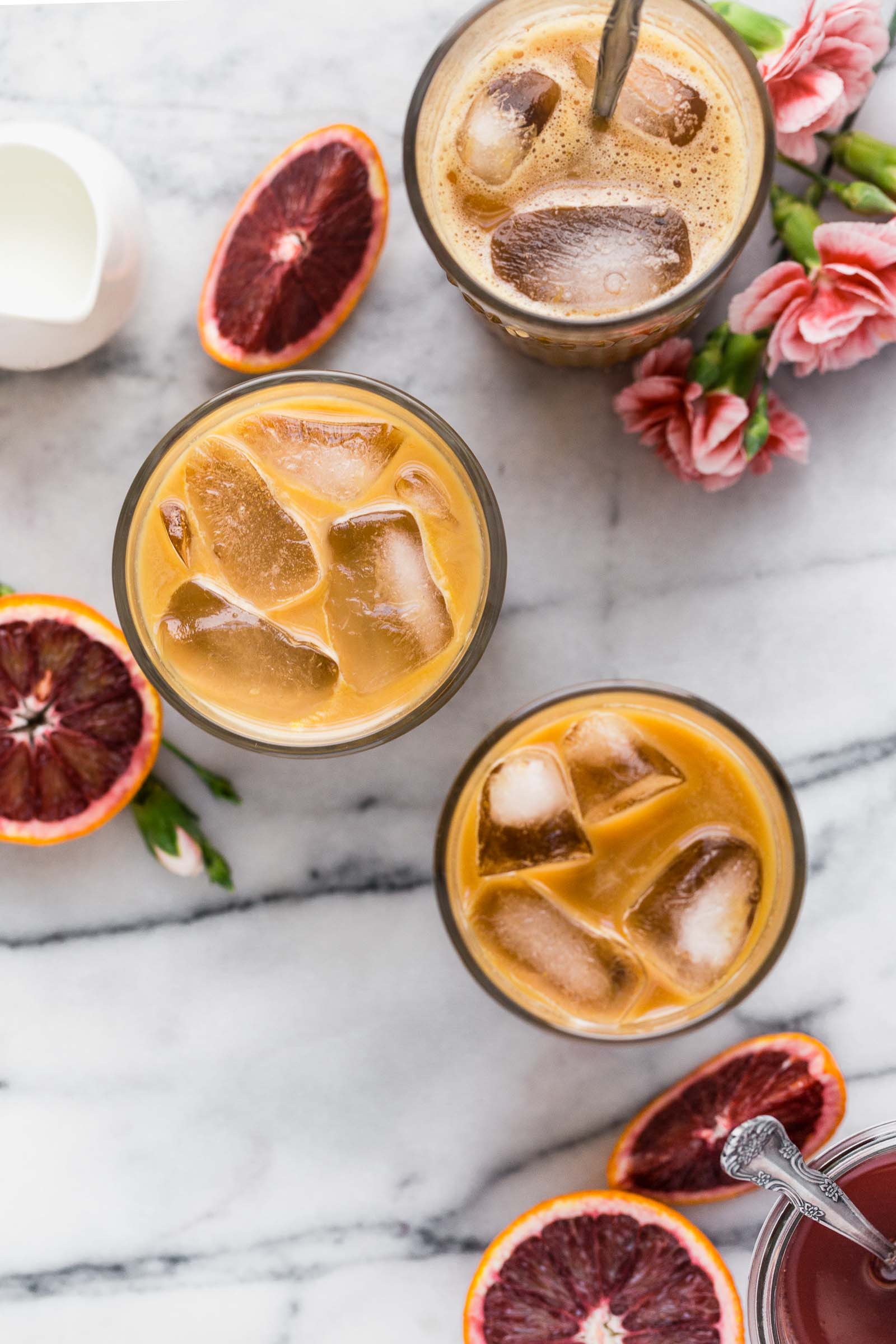 also known as what happens when you spike cold brew coffee with the perfectly not-too-sweet blood orange syrup, blood orange cold brew iced coffee will be your newest winter citrus obsession! #bloodorange #coldbrew #coldbrewcoffee #coldbrewcoffeerecipe #icedcoffee #wintercitrus #playswellwithbutter