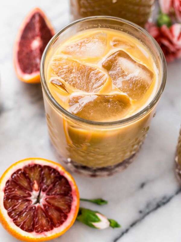 also known as what happens when you spike cold brew coffee with the perfectly not-too-sweet blood orange syrup, blood orange cold brew iced coffee will be your newest winter citrus obsession! #bloodorange #coldbrew #coldbrewcoffee #coldbrewcoffeerecipe #icedcoffee #wintercitrus #playswellwithbutter