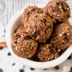 5-ingredient bliss balls couldn’t be easier or more wholesome! loaded with dates, cashews, almonds, coconut & dark chocolate, these bliss balls are the perfect little no-bake energy bites to keep on hand as an on-the-go snack during the week or as a healthy little dessert. #energrybites #blissballs #chocolatecoconut #healthysnack #healthydessert