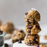 chocolate chip banana bread bliss balls are an easy & totally wholesome snack! inspired by chocolate chip banana bread, but in the form of a healthy, raw energy bite, these chocolate chip banana bread bliss balls are loaded with dates, cashews, almonds, walnuts, and banana. #playswellwithbutter #blissballs #energybites #healthysnack #healthydessert #healthyrecipe #bananabreadbites #bananabread
