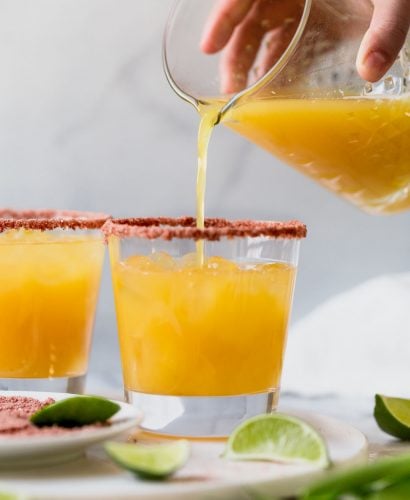 perfectly smoky & sweet, these smoky mango mezcal margaritas are the best way to give your margarita game a little flair! the deep smokiness of mezcal is the perfect pair for sweet mango juice. this smoky mango mezcal margarita recipe is easy to make, & even easier to drink...the only thing missing is chips & guac!