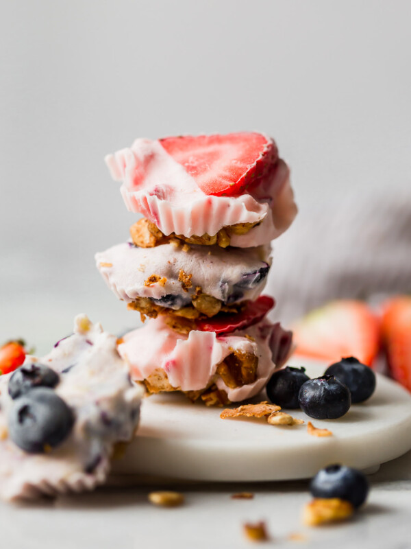easy & healthy frozen yogurt bites call for only 5 ingredients and 10 minutes of active prep time! with wholesome ingredients like greek yogurt, fruit, honey, and your favorite granola, these frozen yogurt bites are as healthy as they are delicious - the best little treat to keep in your freezer this summer! #playswellwithbutter #frozenyogurtbites #frozenyogurt #greekyogurt #healthysnack #glutenfreerecipe #summertreats #summerdesserts