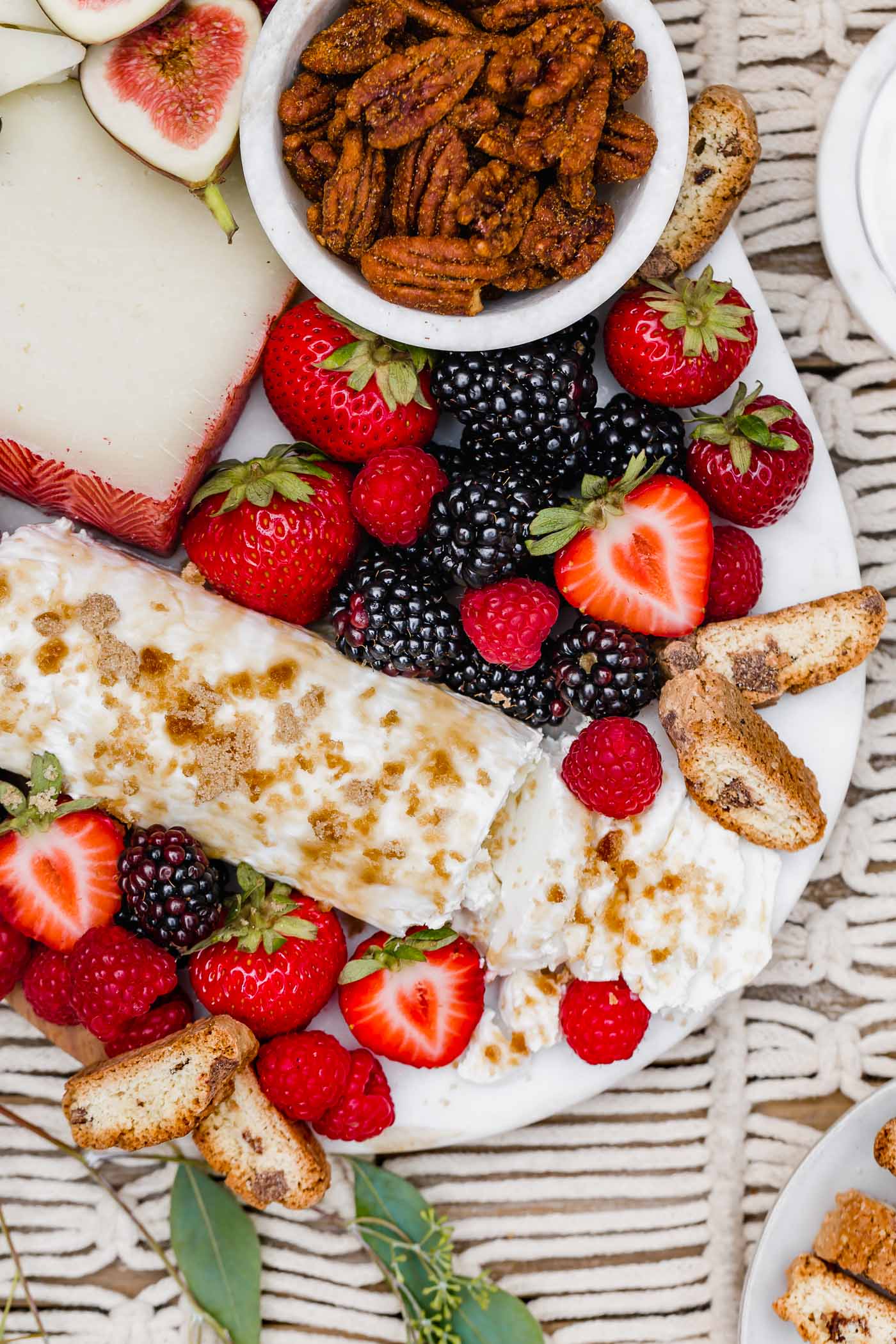 this dessert cheese board is filled with after-dinner cheeses, fresh berries & fall fruits, & includes the perfect wine pairings! the best snacks & appetizers to serve for the ultimate girls night or dinner party this fall. #playswellwithbutter #cheeseboard #dessertcheeseboardideas #cheeseboardideas #girlsnightideas #girlsnightsnacks #girlsnightappetizers #cheeseboardforfall #cheeseboarddisplay #howtomakeacheeseboard