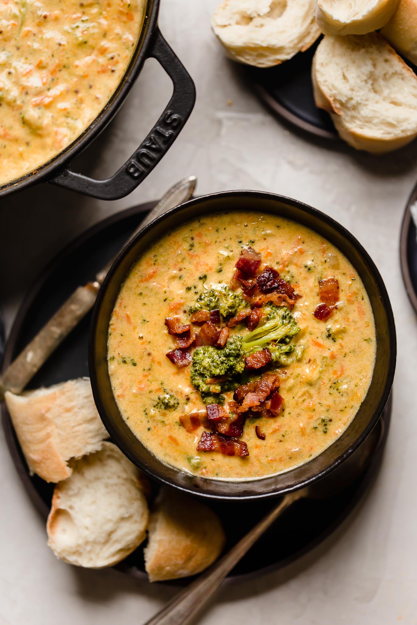 bacon beer cheese broccoli cheddar soup. a cross between two classic comforting soups, beer cheese soup & broccoli cheese soup, this bacon beer cheese broccoli cheddar soup is thick, luscious, creamy, & decadent made with @Tillamook Farmstyle Cut Sharp Cheddar Shredded Cheese. the ultimate comfort food dinner to warm you up on a cold night this winter! #playswellwithbutter #broccolicheddarsoup #broccolicheesesoup #bestbroccolicheesesoup #creamybroccolicheesesoup #beercheesesoup #bestbeercheesesoup #baconbeercheesesoup #comfortfood #comfortfoodrecipes #ad #Tillamook_Partner #TillamookCheese
