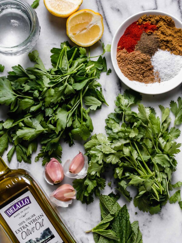 Similar to chimichurri, chermoula is packed with garlic & punchy fresh herbs (like cilantro, parsley, mint), but it also has a hint of warmth from spices common in North African & Middle Eastern cooking (cumin & coriander ftw!). It’s traditionally served over grilled fish...but I’m pretty sure once you have it you’ll want to put it on everythaaang. #playswellwithbutter #chermoula #chermoulasauce #morrocanfood #morrocanrecipes #marinaderecipe #easymarinade #grillingrecipes #chickenmarinade