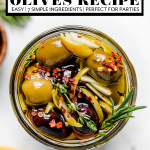 Marinated Olives recipe with graphic text overlay for Pinterest