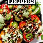 Vegan Stuffed Peppers with graphic text overlay for Pinterest.