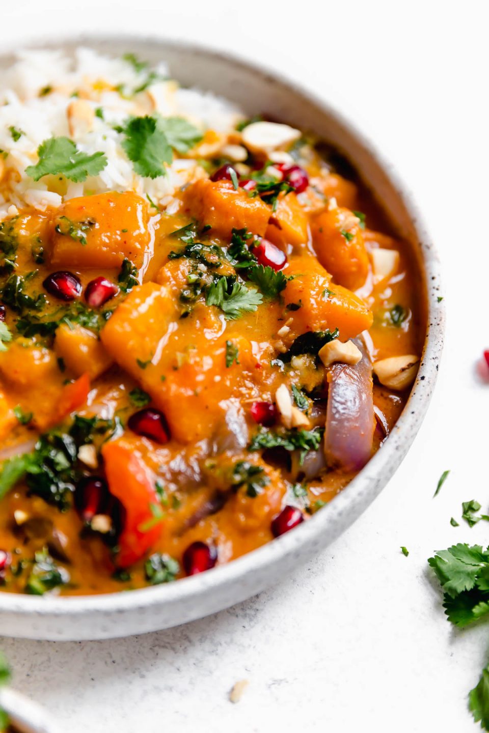 Close shot of butternut squash in this Thai red curry.