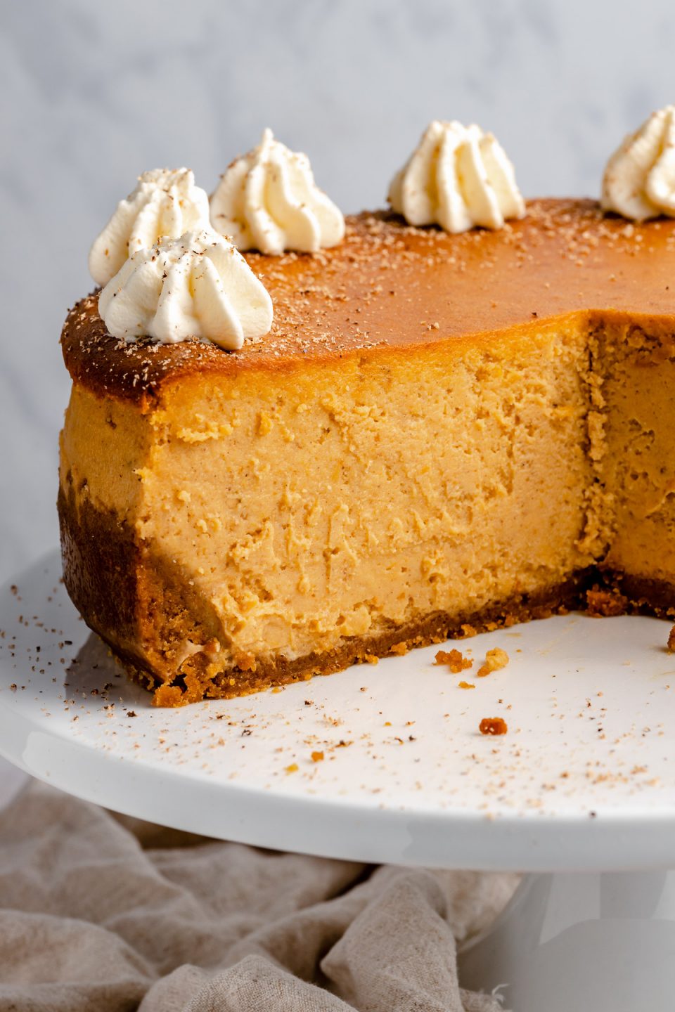 Inside the pumpkin cheesecake, with slices removed from it.