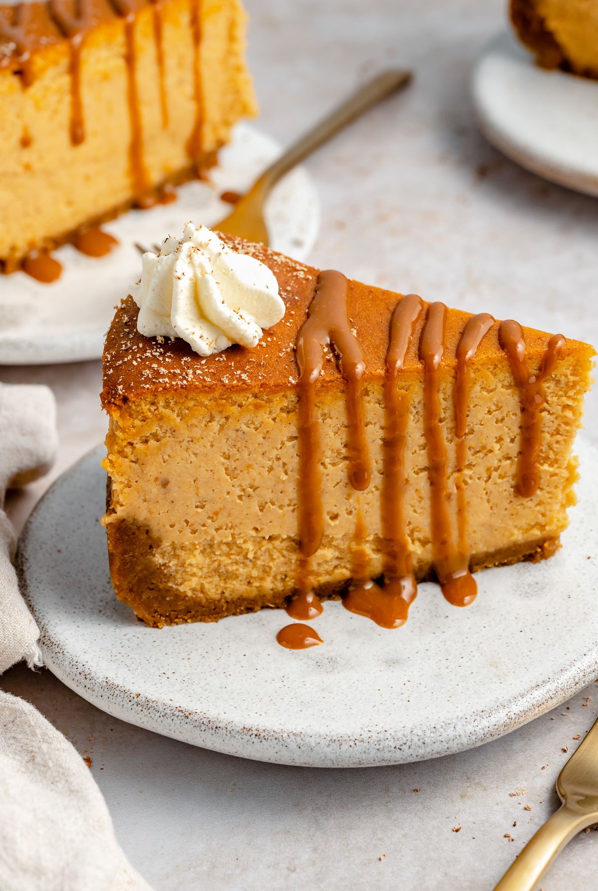 This pumpkin cheesecake with gingersnap crust is the ultimate pumpkin desse...