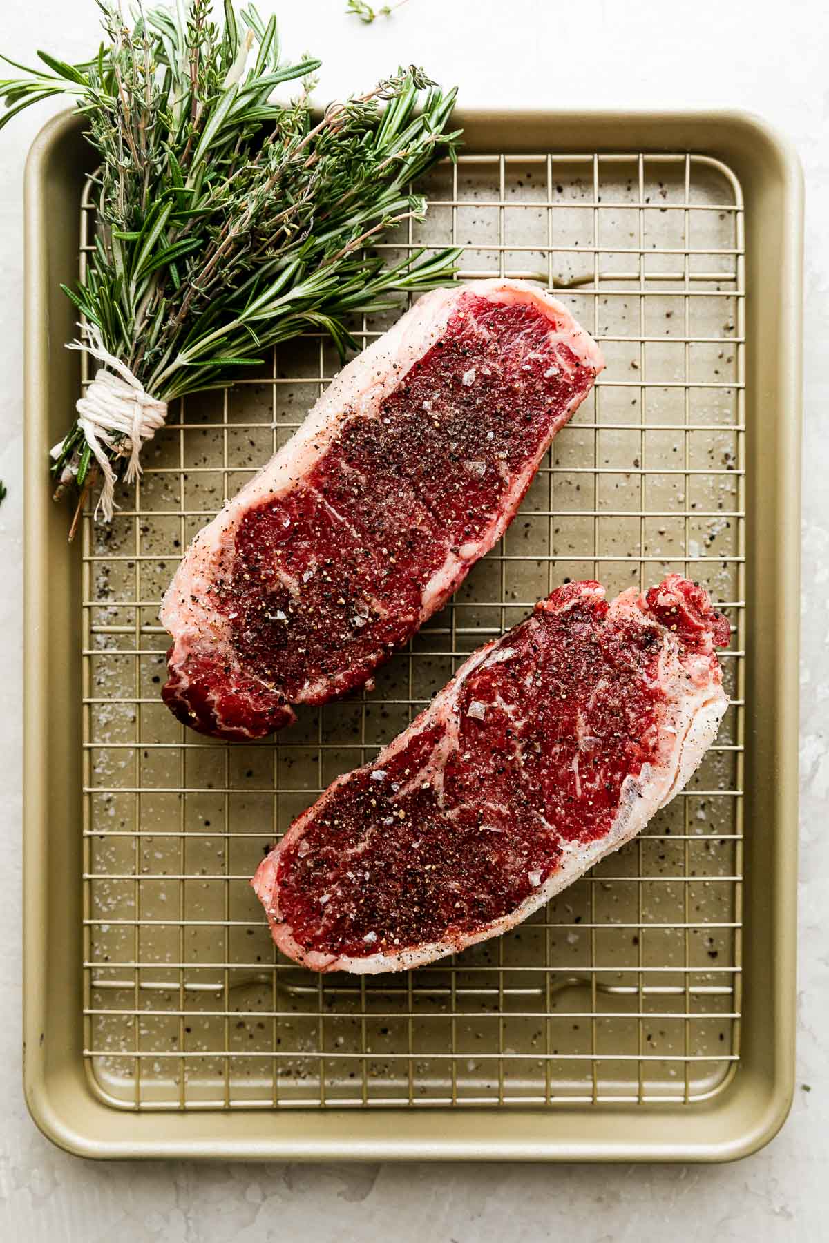 https://playswellwithbutter.com/wp-content/uploads/2022/05/Perfect-Grilled-Steak-Butter-Basted-with-Herb-Brush-9.jpg