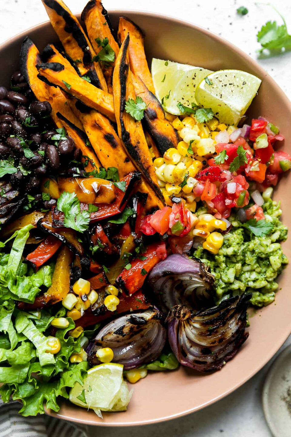 https://playswellwithbutter.com/wp-content/uploads/2022/06/Veggie-Burrito-Bowls-with-Green-Rice-Vegan-Vegetarian-12-960x1440.jpg