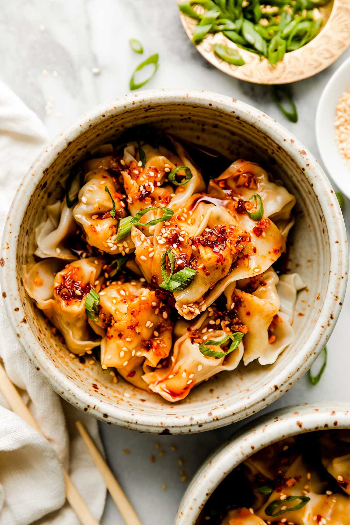 https://playswellwithbutter.com/wp-content/uploads/2023/05/Chicken-Wontons-with-Spicy-Chili-Oil-26.jpg