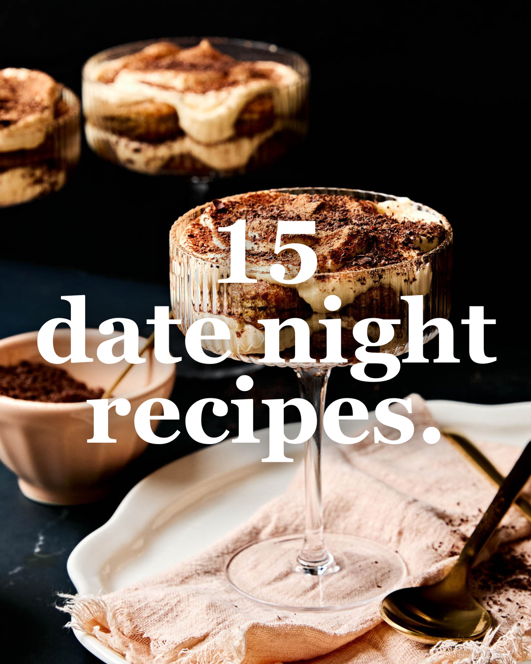 A glass dessert dish filled with creamy tiramisu sits on a pink napkin with a gold spoon beside it. The text 15 date night recipes is overlaid, hinting at indulgent desserts perfect for date night meals. Other treats blur in the background.